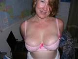 Fabulous big Milf Boobs in a Tight Pink Bra. Gorgeous housewife ...
