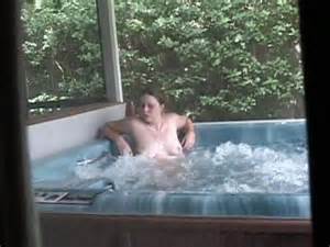 MILF Picture - Spy cam on next door neighbor MILF topless in hot tub