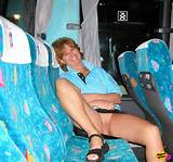 Crazy old milf flashing her aged pussy in the back of a touring bus ...