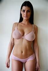 ... curvy, fit MILF in sheer, light pink bra and panties... (Who is she