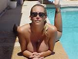 Free porn pics of Busty milf tanning by pool 8 of 12 pics