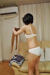 Pretty asian MILF Mayumi Iihara undressing and masturbating her cunt ...