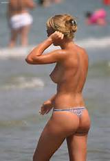 Voyeured topless girl on the beach - VoyeurClouds Beach Voyeur Section ...